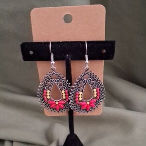 Paparazzi Pink and Yellow Dangle Earrings with Intricate Metalwork